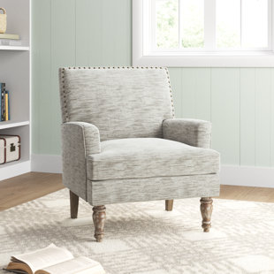 Loralie upholstered spindle discount armchair